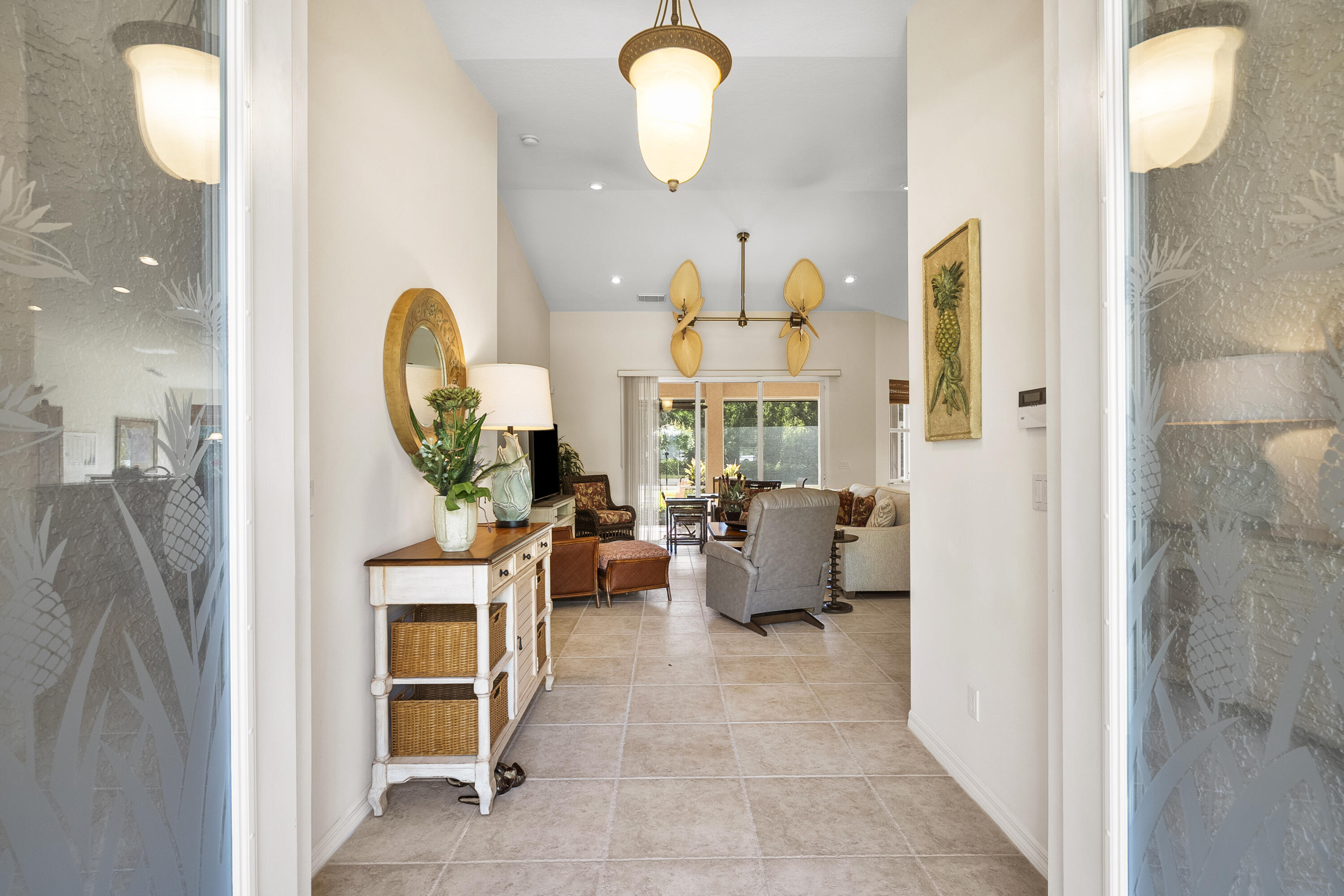 1234 Southwest Locks Road Stuart, FL 34997 - Photo 5 of 53 a living room with couches and painted walls