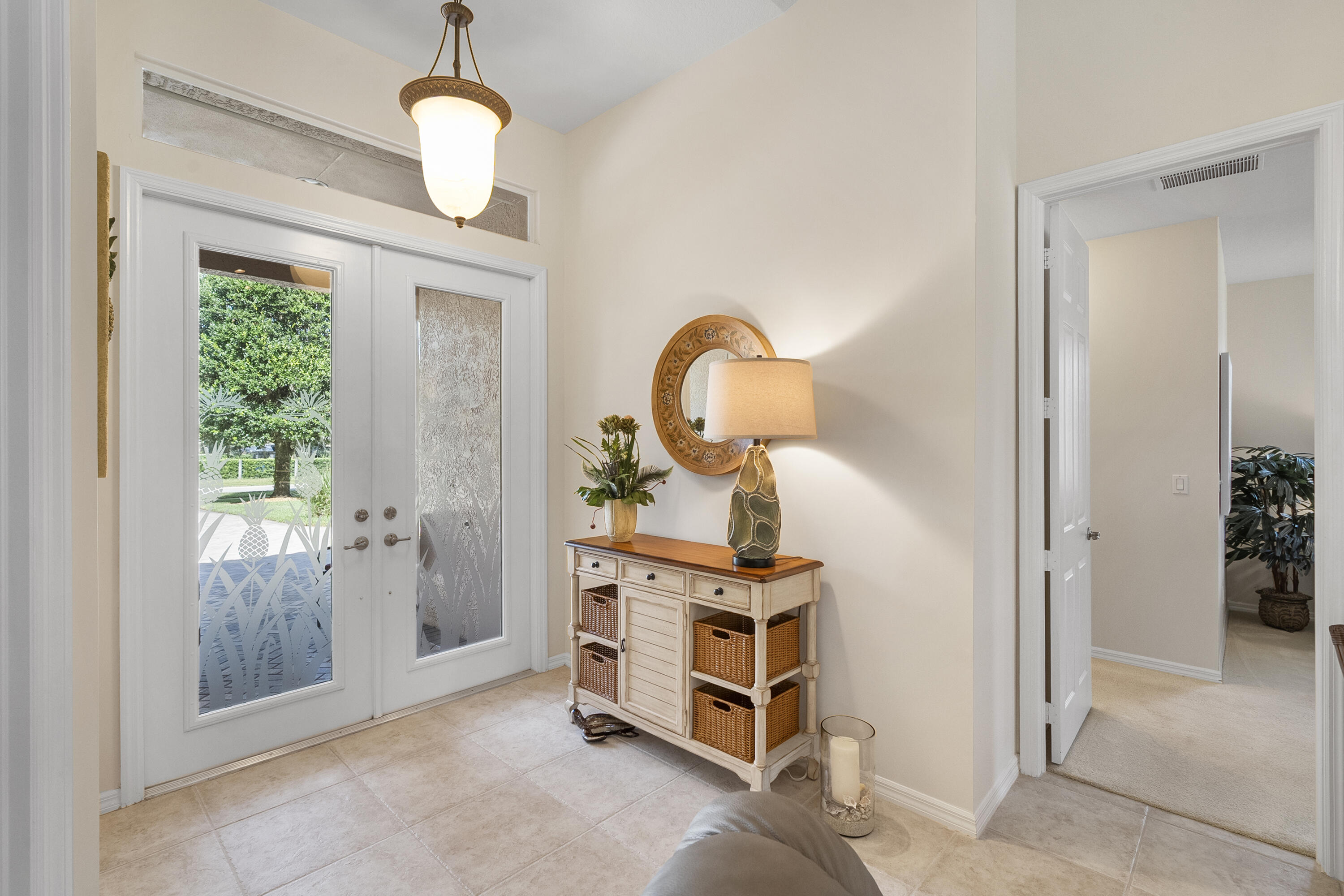 1234 Southwest Locks Road Stuart, FL 34997 - Photo 6 of 53 a view of a livingroom with a furniture and entryway