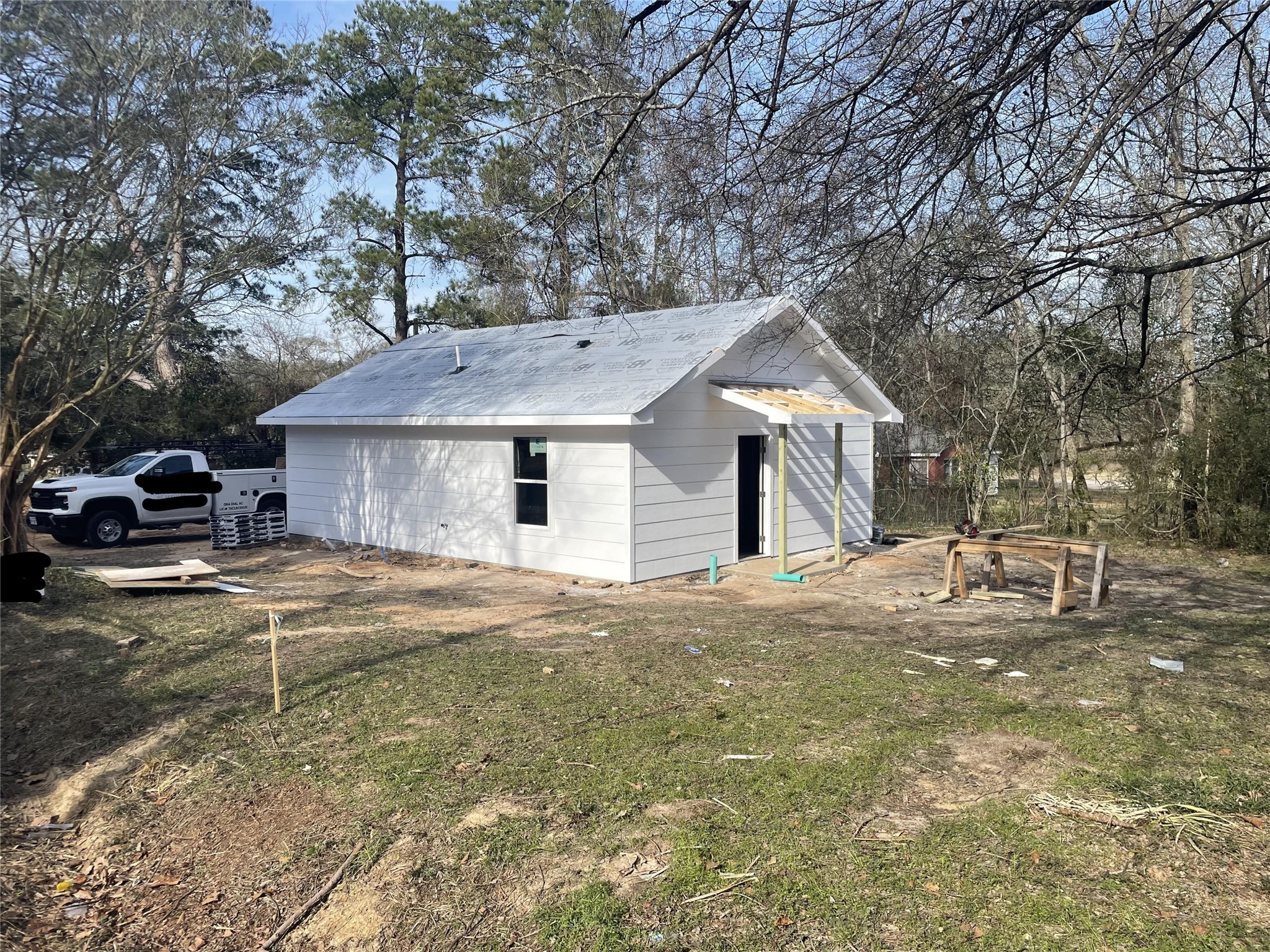 509 Ward Street Lufkin, TX 75901 - Photo 6 of 6 a front view of a house with a yard and garage