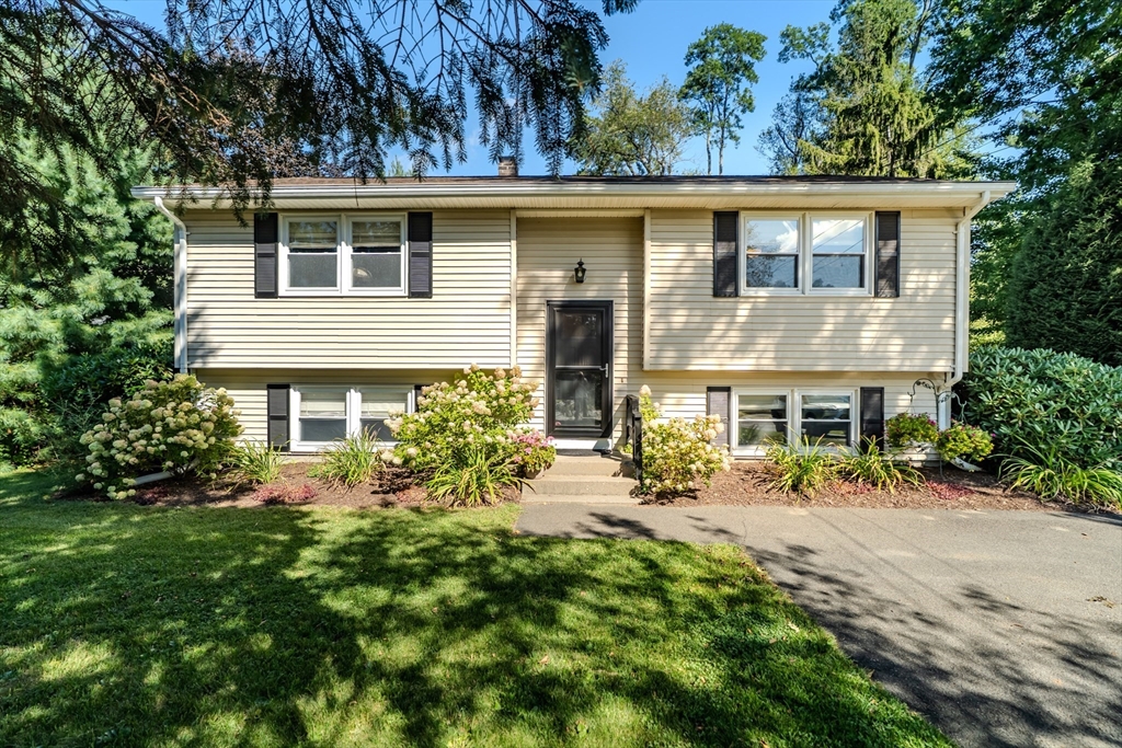 447 Ryan Road Northampton, MA 01062 - Photo 1 of 42 a front view of a house with garden