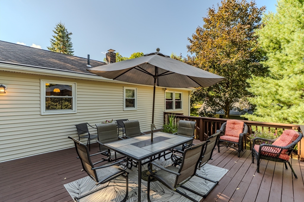 447 Ryan Road Northampton, MA 01062 - Photo 13 of 42 a patio with a table and chairs