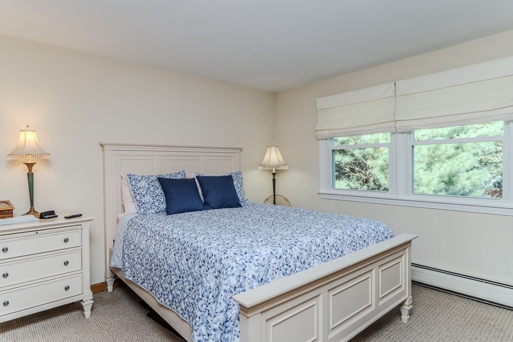 447 Ryan Road Northampton, MA 01062 - Photo 14 of 42 a bedroom with a bed and a window