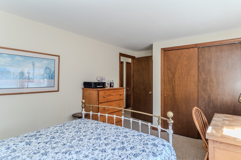 447 Ryan Road Northampton, MA 01062 - Photo 19 of 42 a bedroom with a bed and furniture
