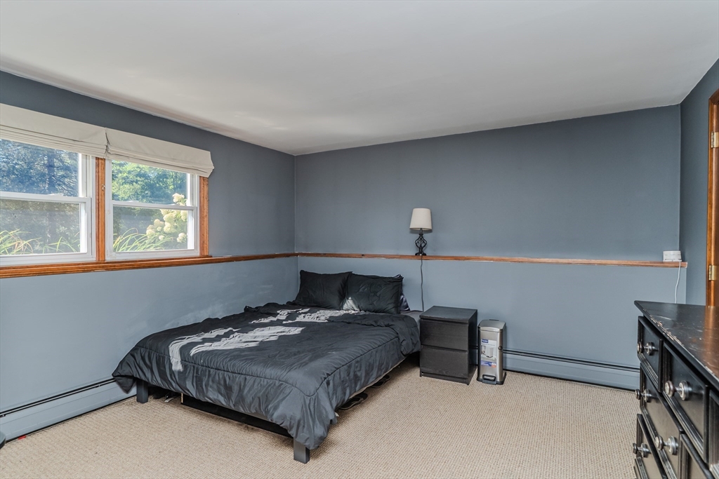 447 Ryan Road Northampton, MA 01062 - Photo 20 of 42 a bedroom with a bed and window