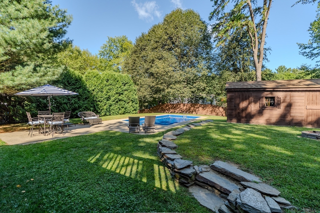447 Ryan Road Northampton, MA 01062 - Photo 27 of 42 a view of backyard with swimming pool and seating space