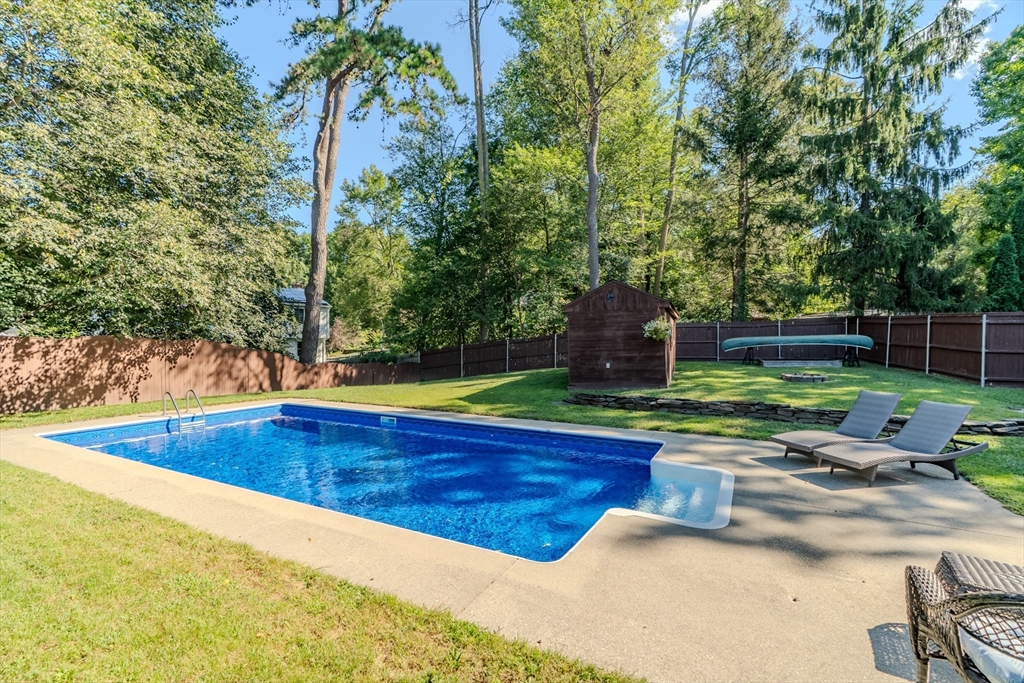 447 Ryan Road Northampton, MA 01062 - Photo 29 of 42 a view of a swimming pool with a yard
