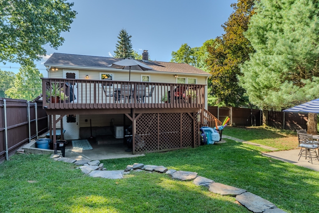 447 Ryan Road Northampton, MA 01062 - Photo 34 of 42 a view of backyard with a garden and deck