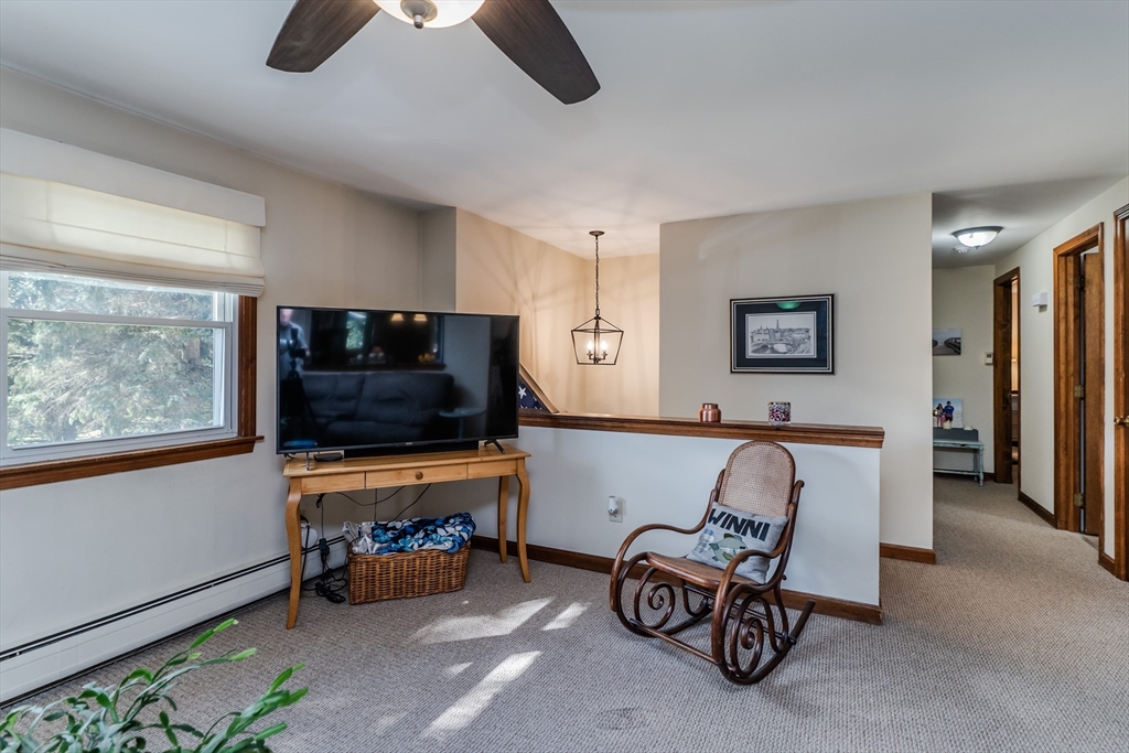 447 Ryan Road Northampton, MA 01062 - Photo 4 of 42 a living room with furniture and a flat screen tv