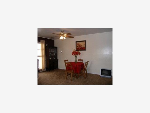 1317 Devonshire Avenue San Leandro, CA 94579 - Photo 2 of 9 a living room with furniture and a mirror