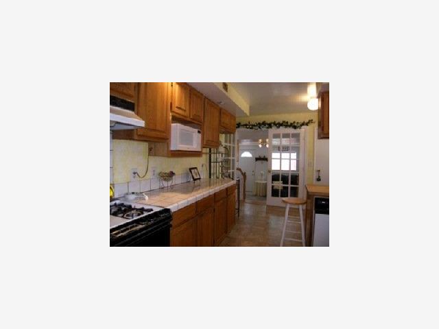 1317 Devonshire Avenue San Leandro, CA 94579 - Photo 6 of 9 a kitchen with stainless steel appliances a sink and stove top oven
