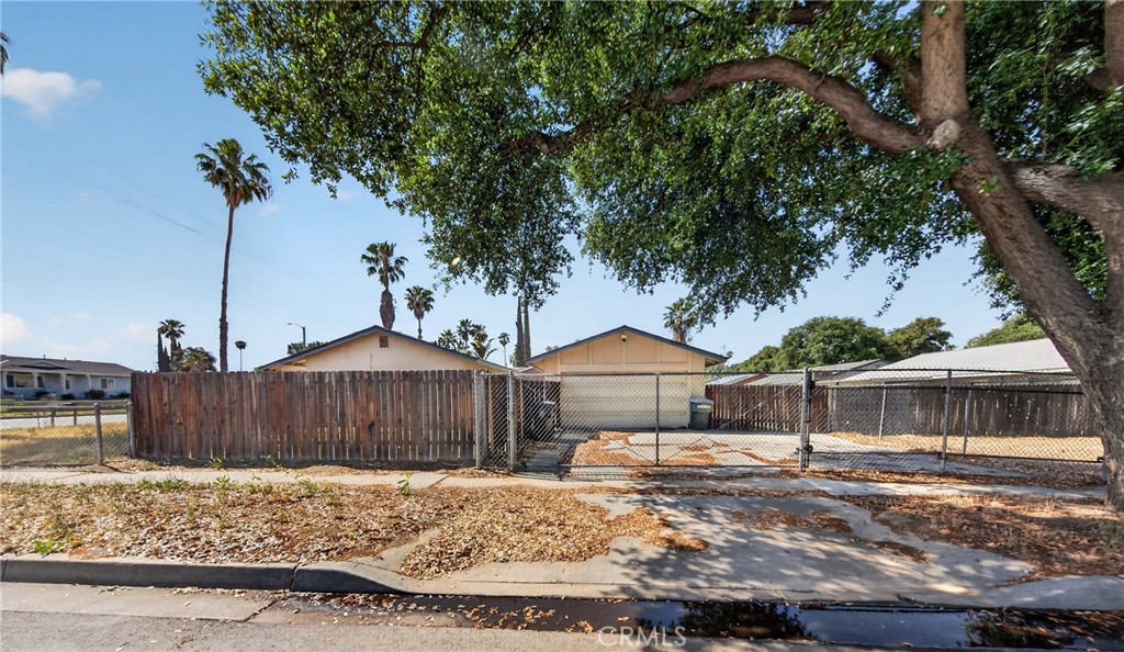 1631 Church Street Redlands, CA 92374 - Photo 3 of 11 a backyard of a house with table and chairs