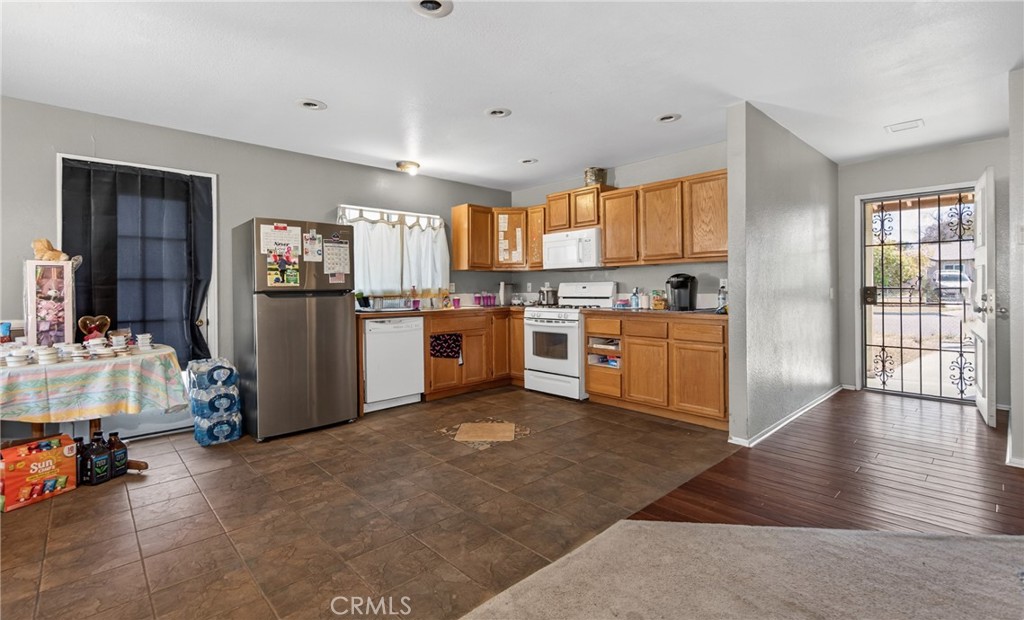 1631 Church Street Redlands, CA 92374 - Photo 8 of 11 a kitchen with cabinets and wooden floor