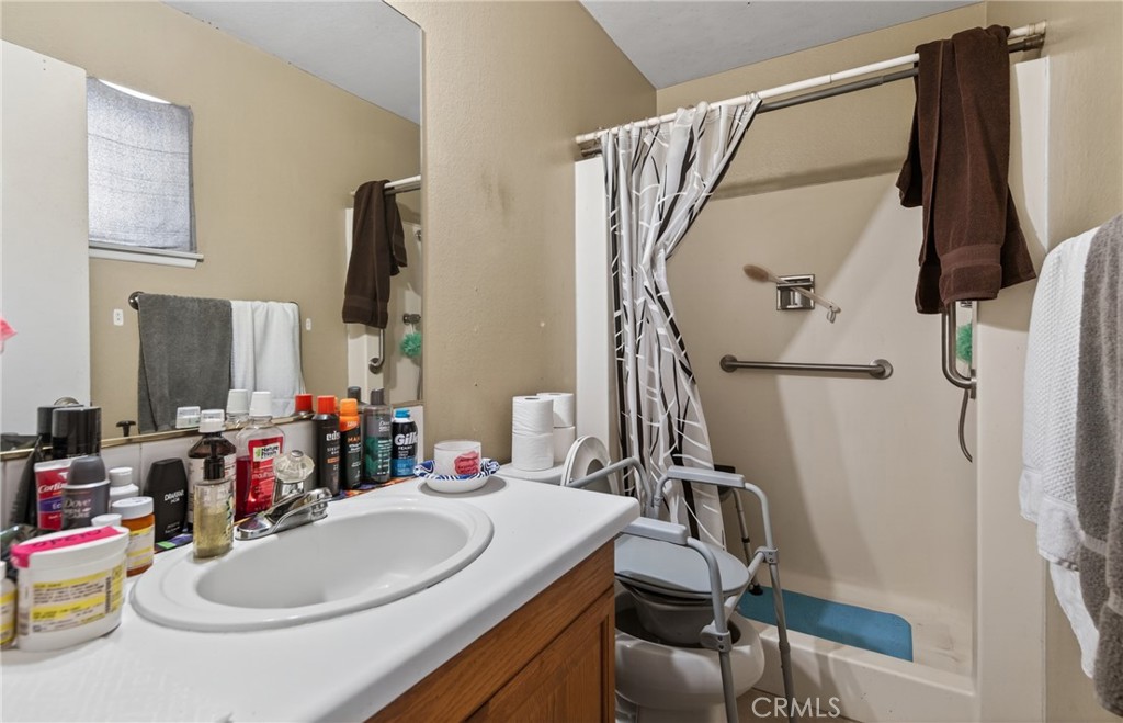 1631 Church Street Redlands, CA 92374 - Photo 10 of 11 a bathroom with a sink and a mirror
