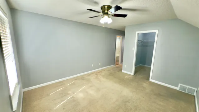 a view of a house with backyard porch and wooden floor