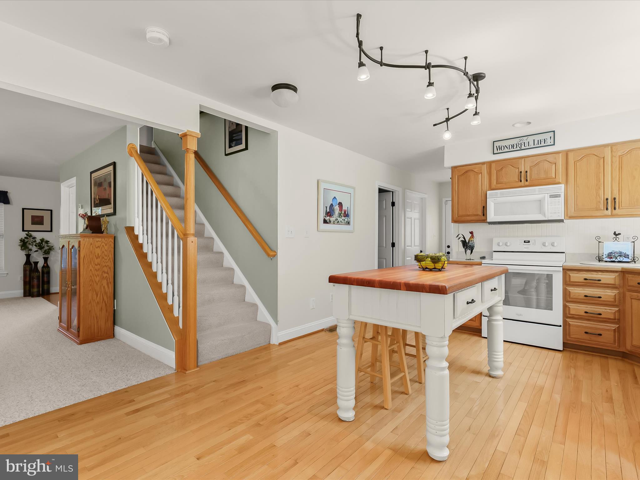 2913 Duncan Road White Hall, MD 21161 - Photo 22 of 85 a room with stainless steel appliances kitchen island granite countertop furniture and a kitchen view
