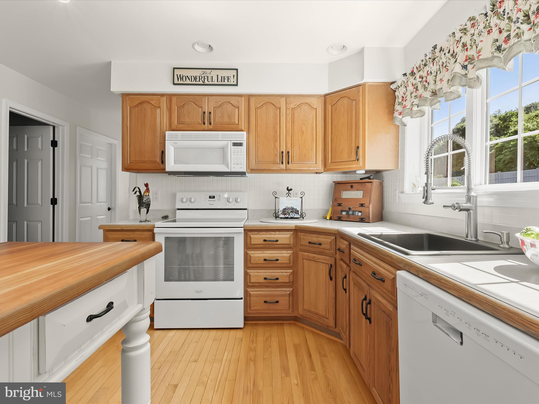 2913 Duncan Road White Hall, MD 21161 - Photo 24 of 85 a kitchen with stainless steel appliances granite countertop a stove a sink and a microwave