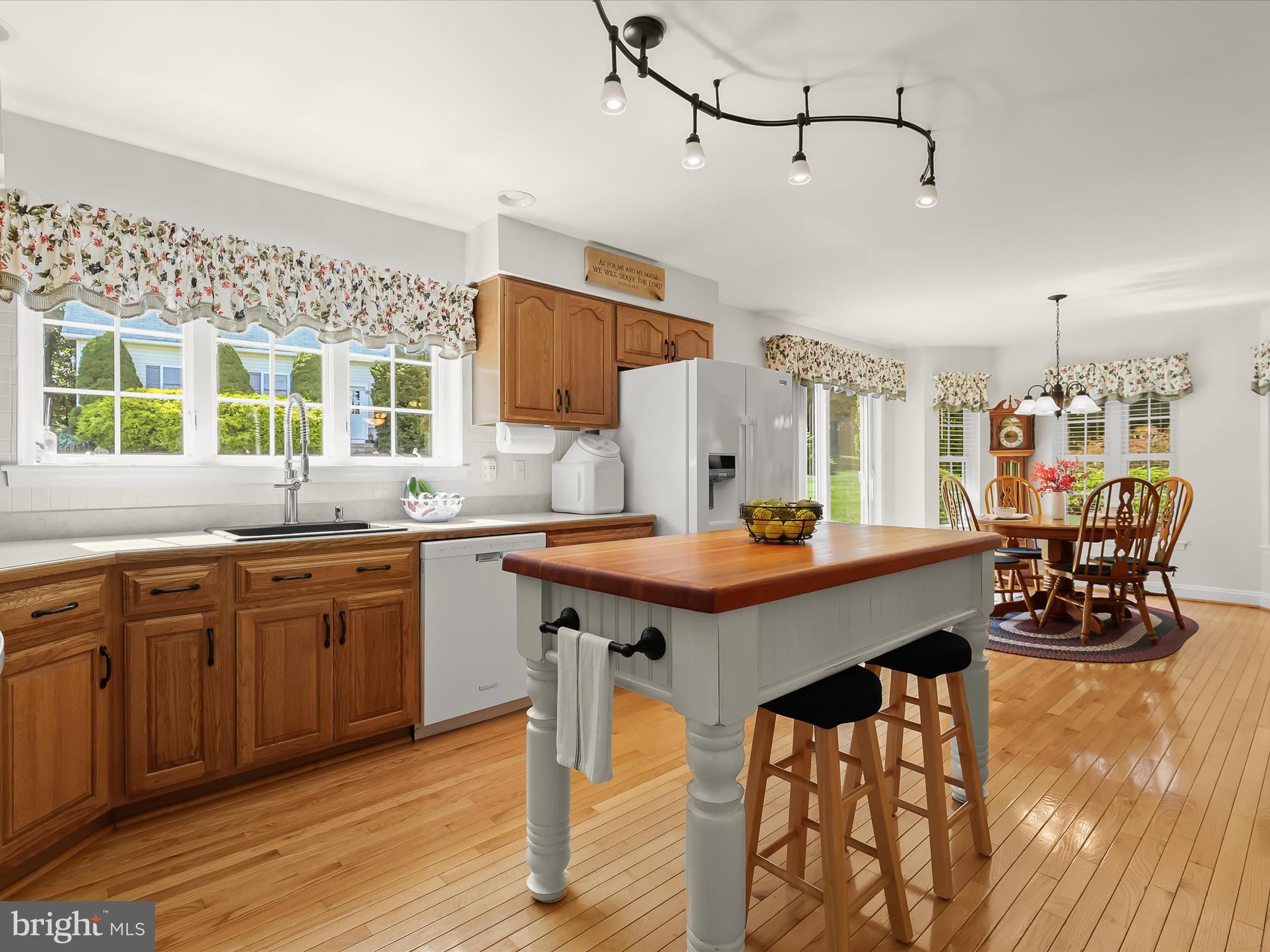 2913 Duncan Road White Hall, MD 21161 - Photo 26 of 85 a kitchen with a table chairs stove and cabinets