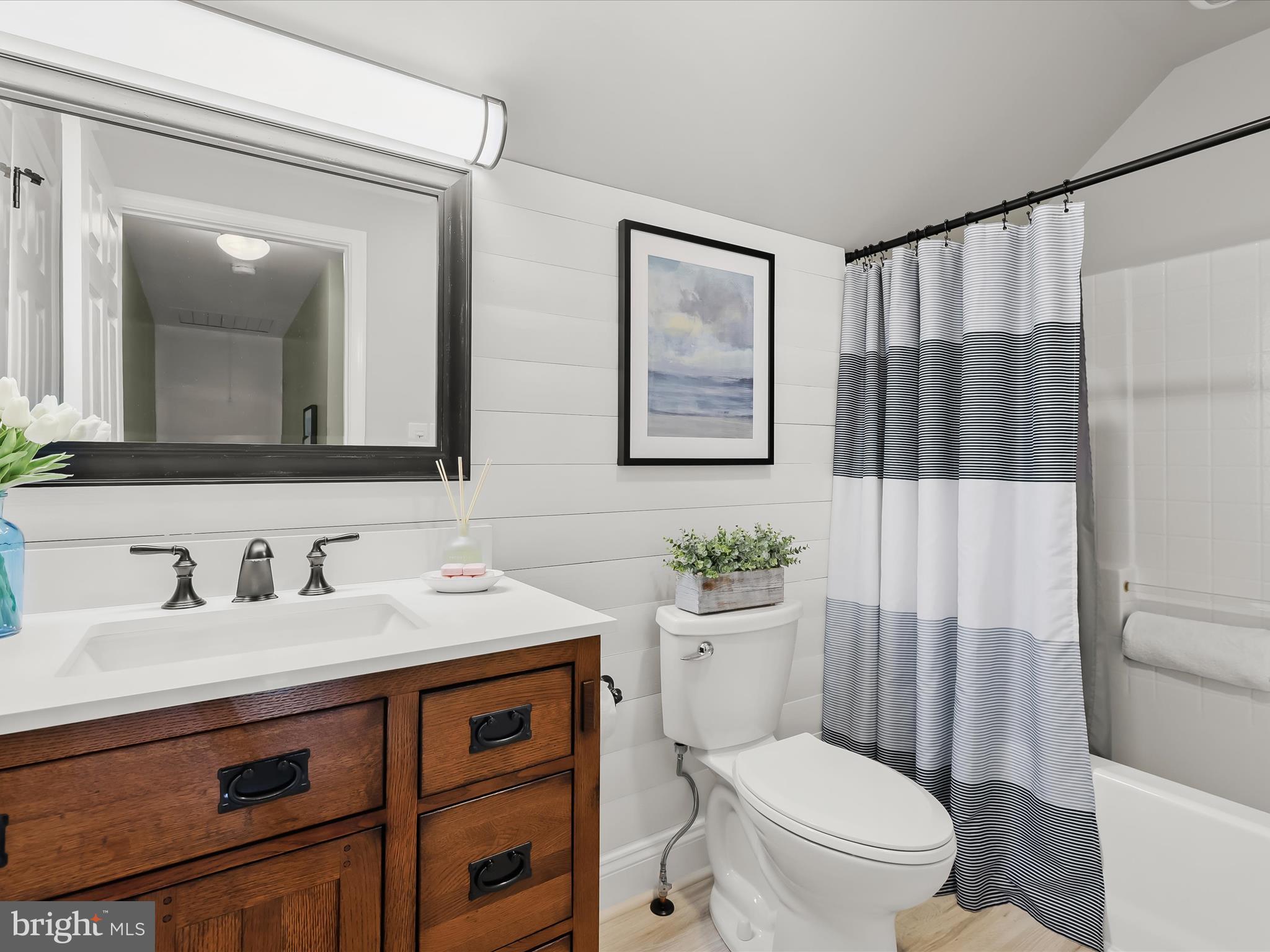2913 Duncan Road White Hall, MD 21161 - Photo 43 of 85 a bathroom with a sink a toilet and shower