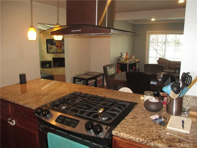 a kitchen with table and chairs