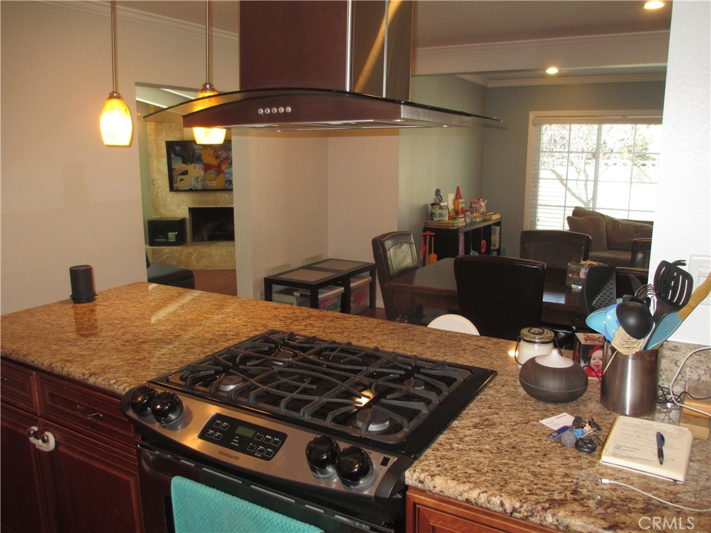 2281 Faust Avenue Long Beach, CA 90815 - Photo 16 of 41 a kitchen with table and chairs