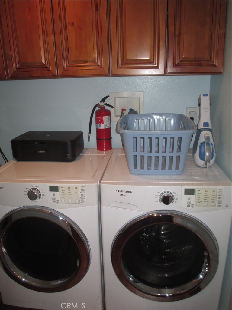 2281 Faust Avenue Long Beach, CA 90815 - Photo 18 of 41 a utility room with dryer and washer