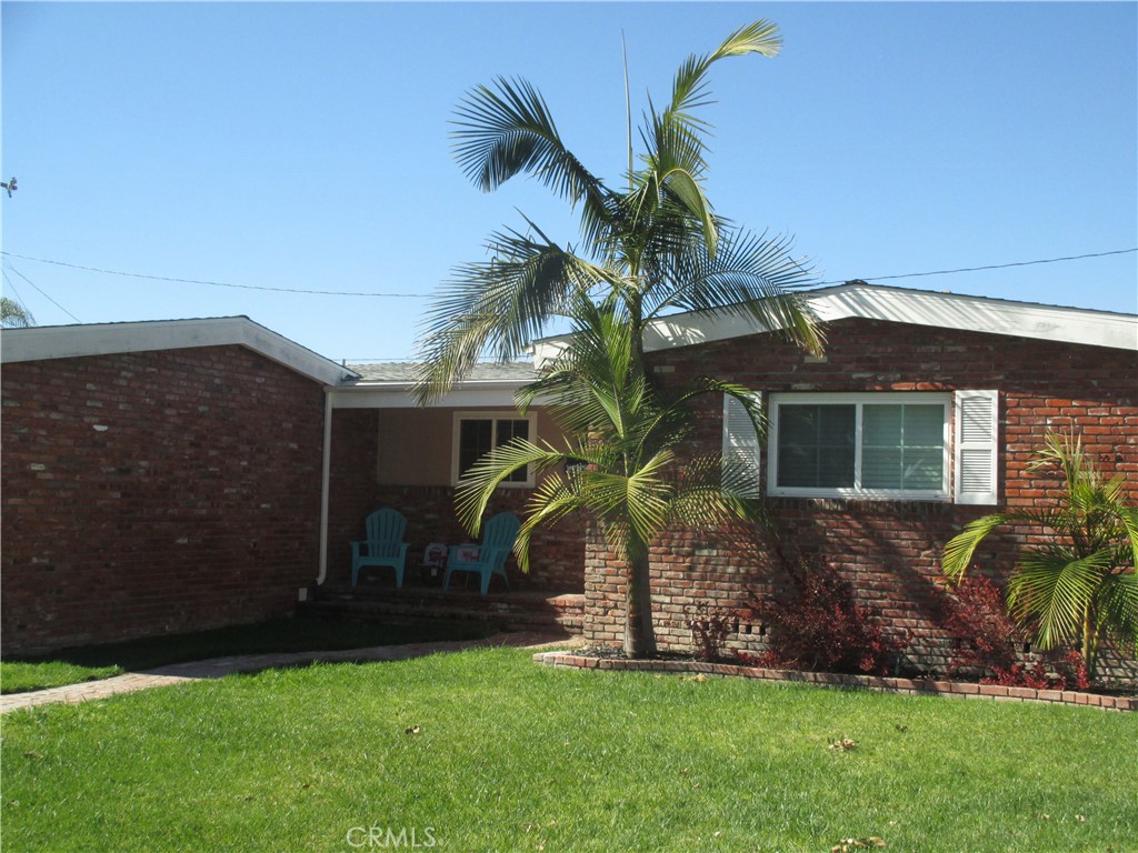 2281 Faust Avenue Long Beach, CA 90815 - Photo 2 of 41 a front view of house with a garden