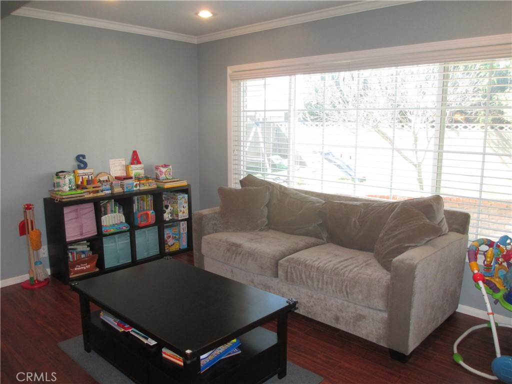 2281 Faust Avenue Long Beach, CA 90815 - Photo 28 of 41 a living room with furniture and a window