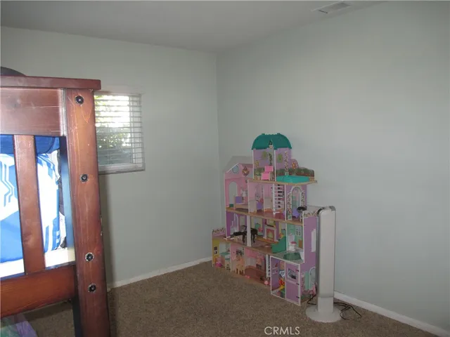 a room with furniture and a window