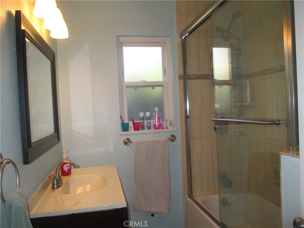 2281 Faust Avenue Long Beach, CA 90815 - Photo 37 of 41 a bathroom with a tub and shower