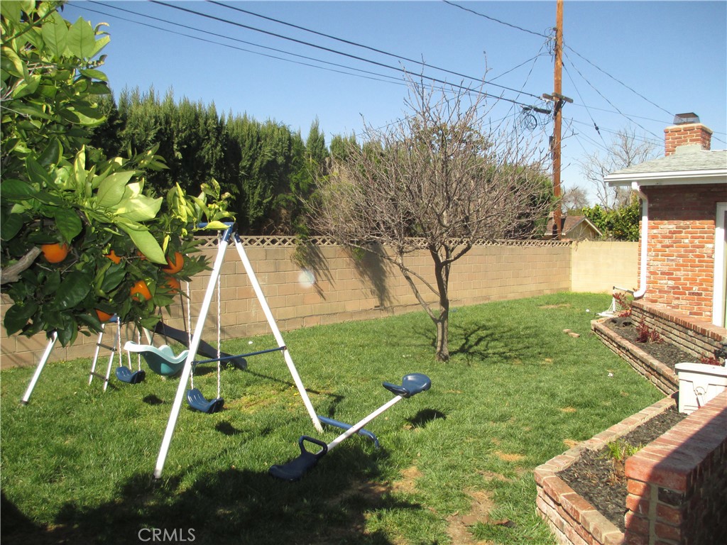2281 Faust Avenue Long Beach, CA 90815 - Photo 4 of 41 a backyard of a house with table and chairs