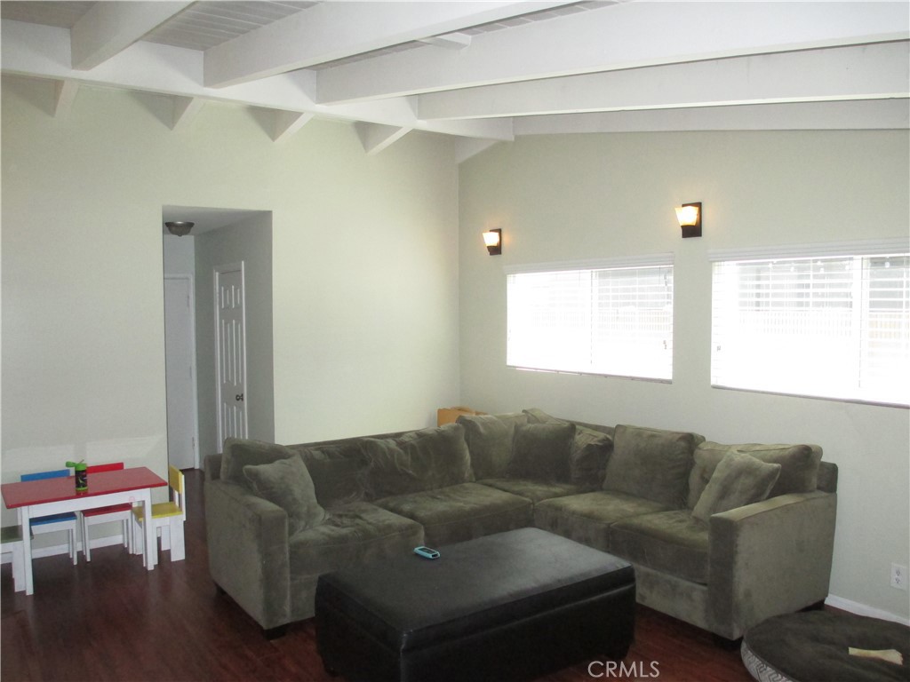 2281 Faust Avenue Long Beach, CA 90815 - Photo 10 of 41 a living room with furniture and a window