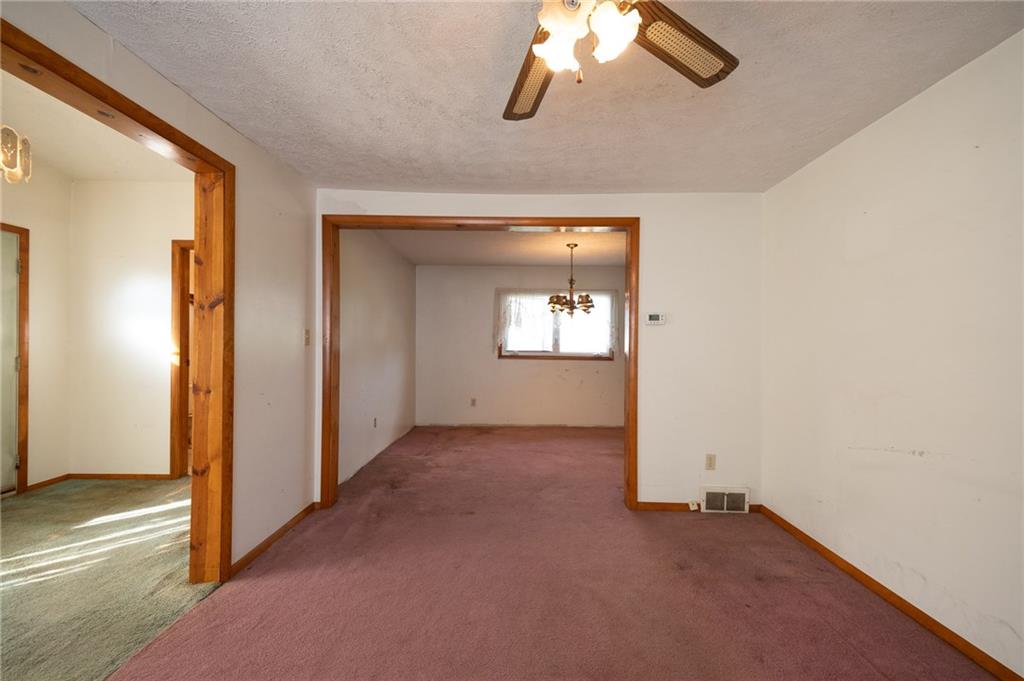 314 Center Grange Road Monaca, PA 15061 - Photo 6 of 20 Living room is open to the Dining room and the added on room that can be used as a Den/Office or additional sitting area