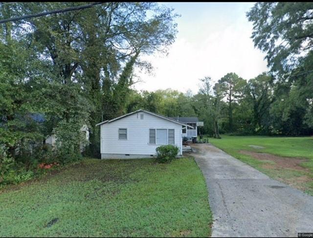 403 East 17th Street Rome, GA 30161 - Photo 1 of 1 a view of a house with yard and a garden