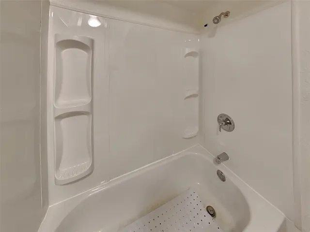 a bathroom with a tub