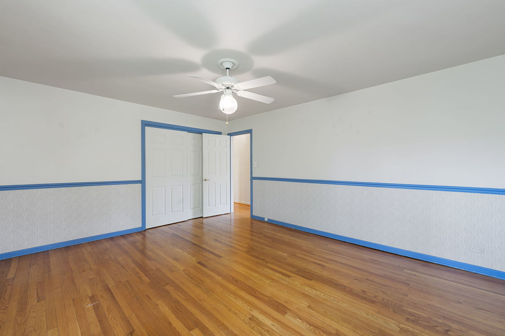 824 Braemar Road Flossmoor, IL 60422 - Photo 19 of 29 a view of an empty room with wooden floor