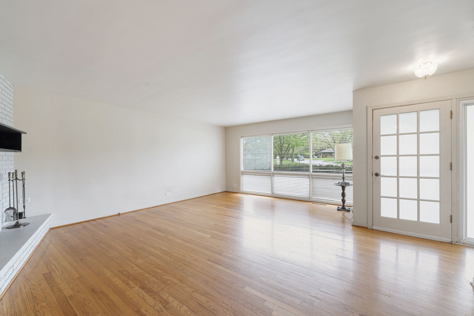 824 Braemar Road Flossmoor, IL 60422 - Photo 2 of 29 a view of empty room with wooden floor and fan