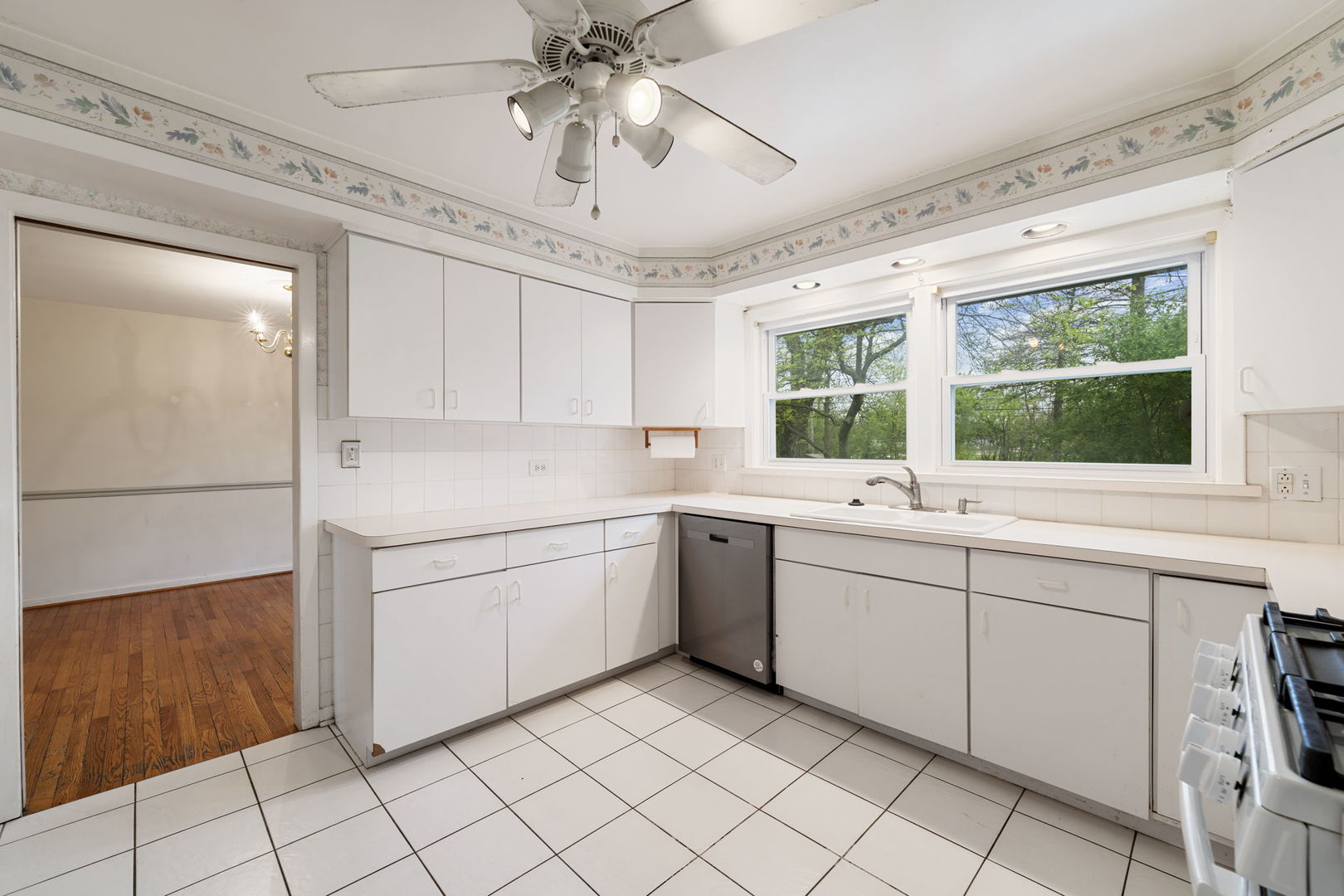 824 Braemar Road Flossmoor, IL 60422 - Photo 6 of 29 a kitchen with sink cabinets and window