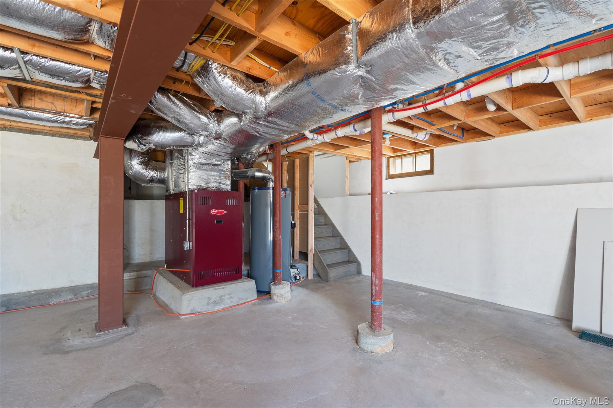 70 Barmore Road LaGrangeville, NY 12540 - Photo 29 of 47 Basement with gas water heater, stairway, and heating unit