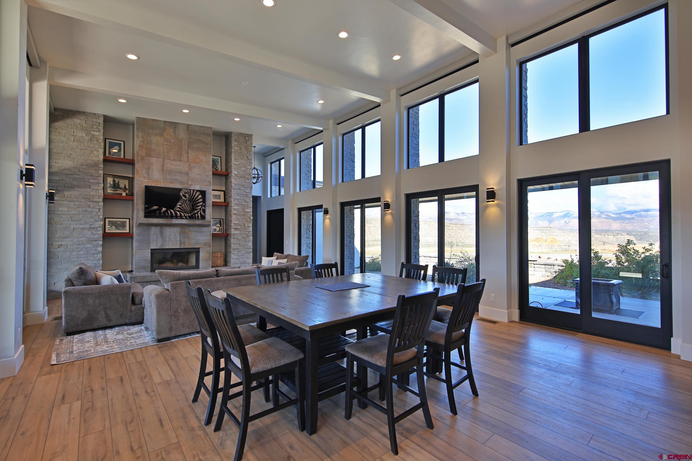12471 54 7/10 Road Molina, CO 81646 - Photo 12 of 35 a dining room with furniture window and wooden floor