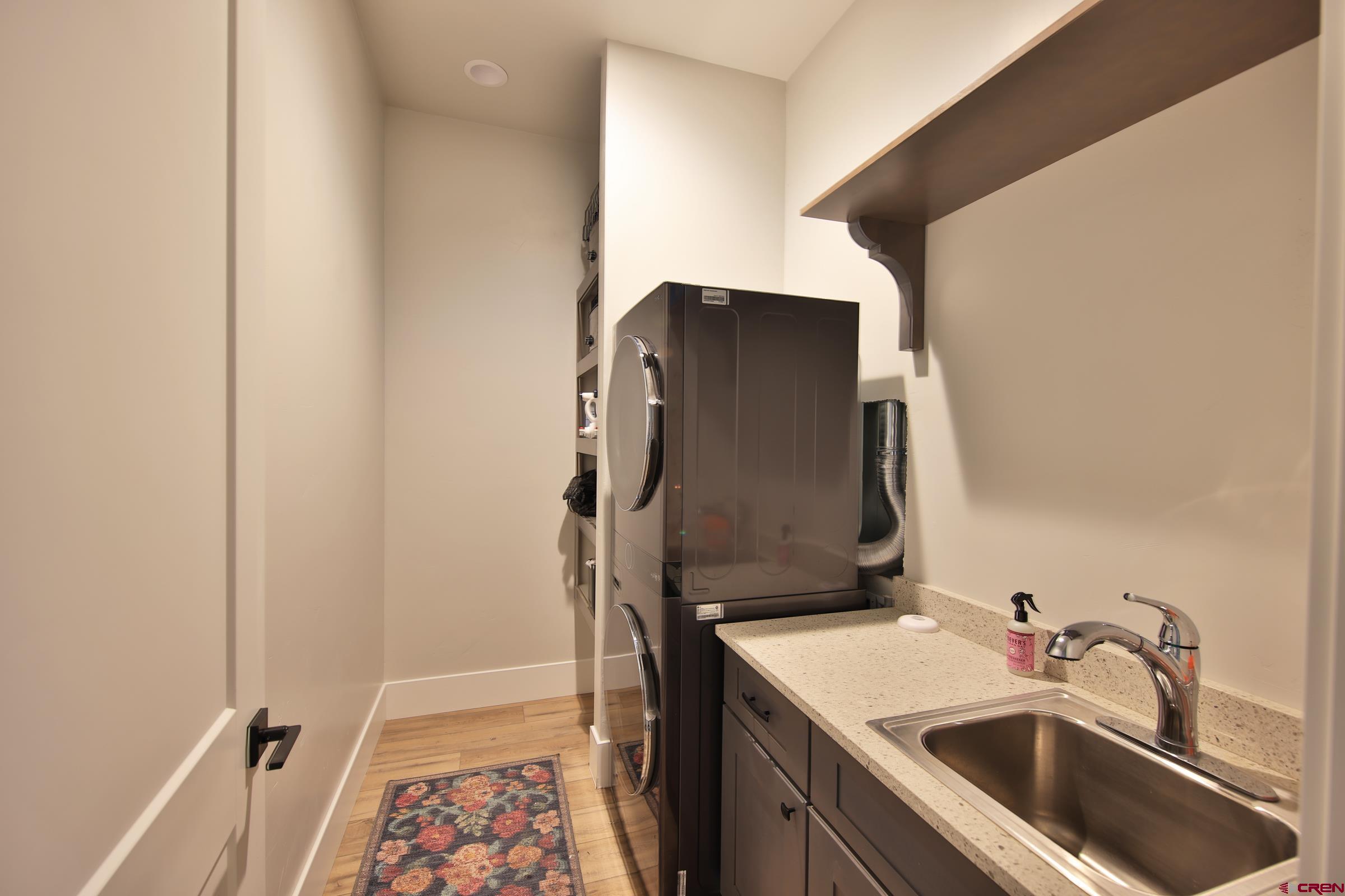 12471 54 7/10 Road Molina, CO 81646 - Photo 27 of 35 a bathroom with a sink and mirror