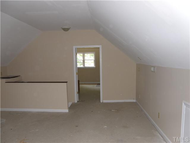 2508 Ashley Court Raleigh, NC 27607 - Photo 11 of 12 This bonus is partly re-finished, needs new carpet, seller can work with buyer to pick out carpet colors with acceptable offer.