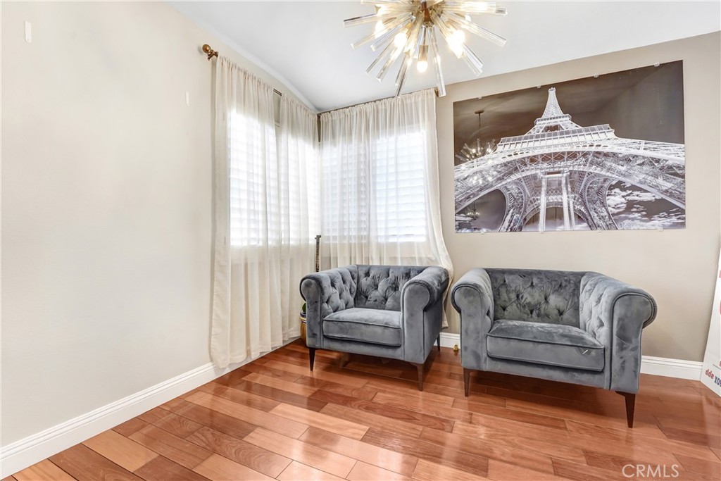25803 Browning Place Stevenson Ranch, CA 91381 - Photo 8 of 20 a living room with furniture and a large window