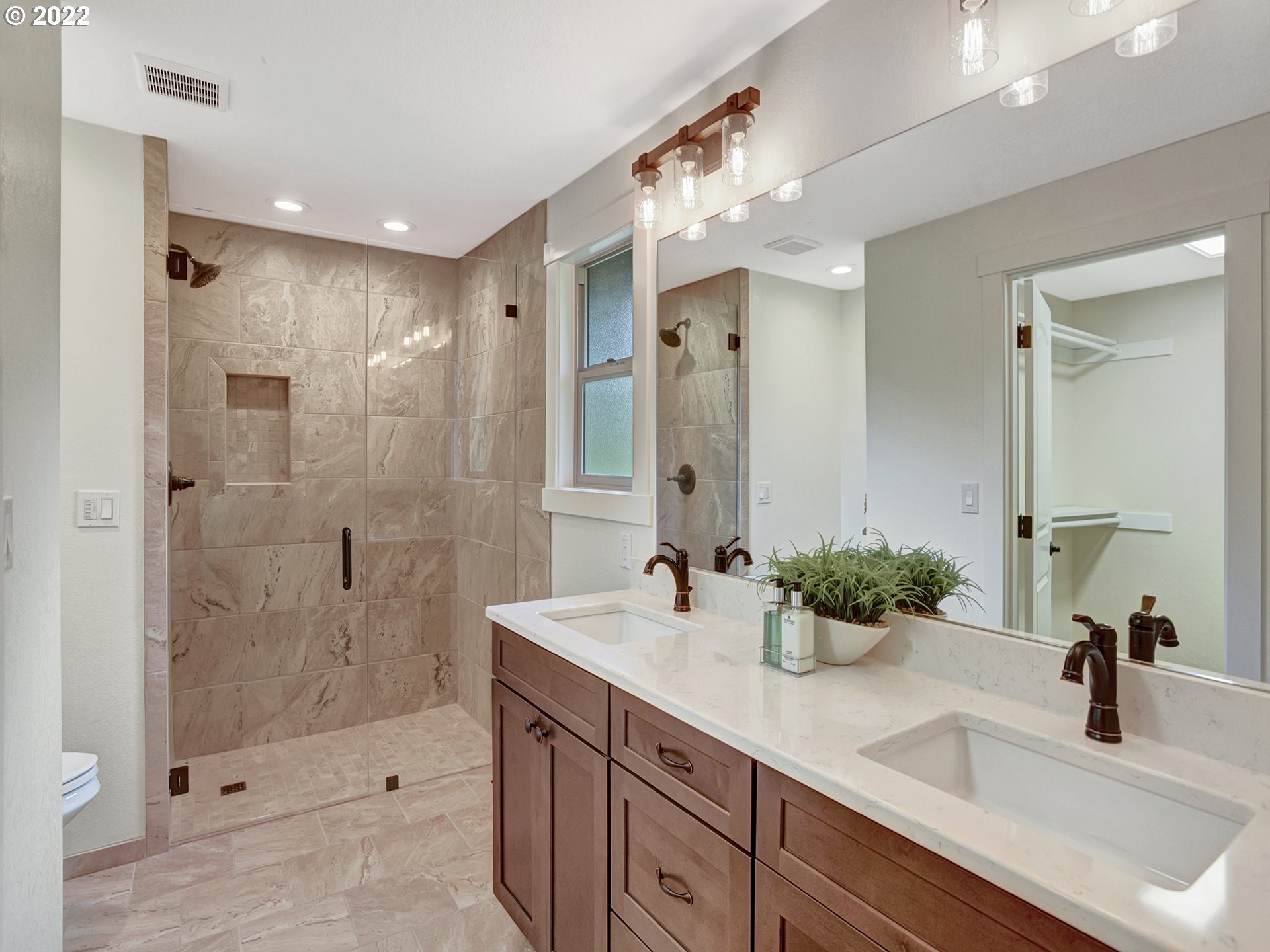 37490 Southeast Dunn Road Sandy, OR 97055 - Photo 11 of 29 a bathroom with a shower sink and mirror