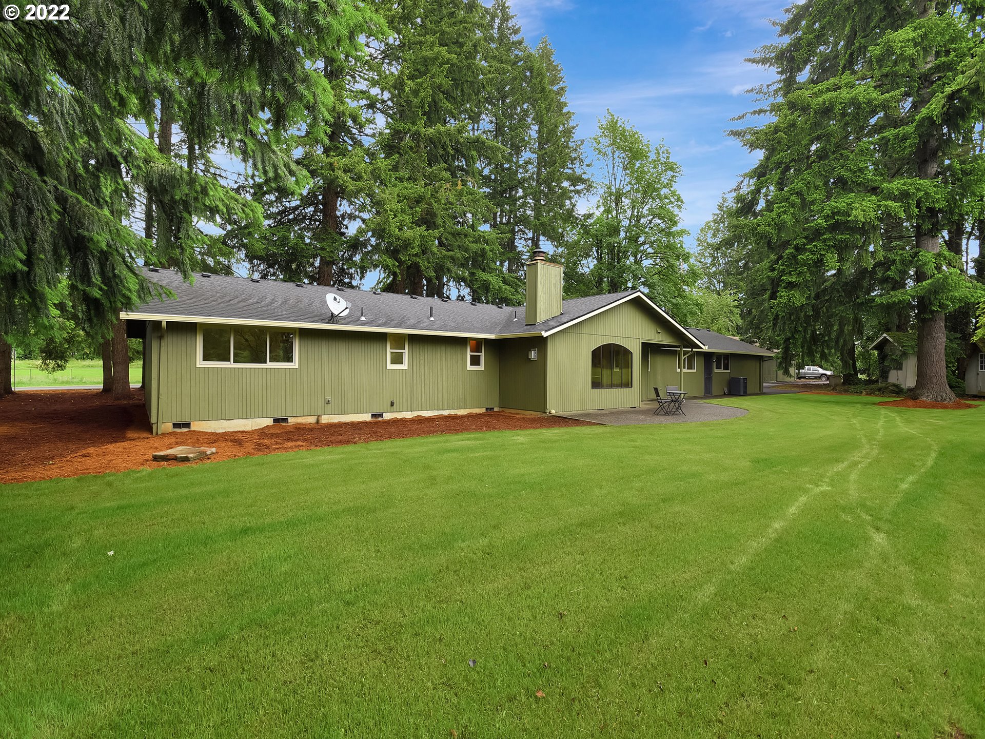 37490 Southeast Dunn Road Sandy, OR 97055 - Photo 20 of 29 a front view of a house with garden