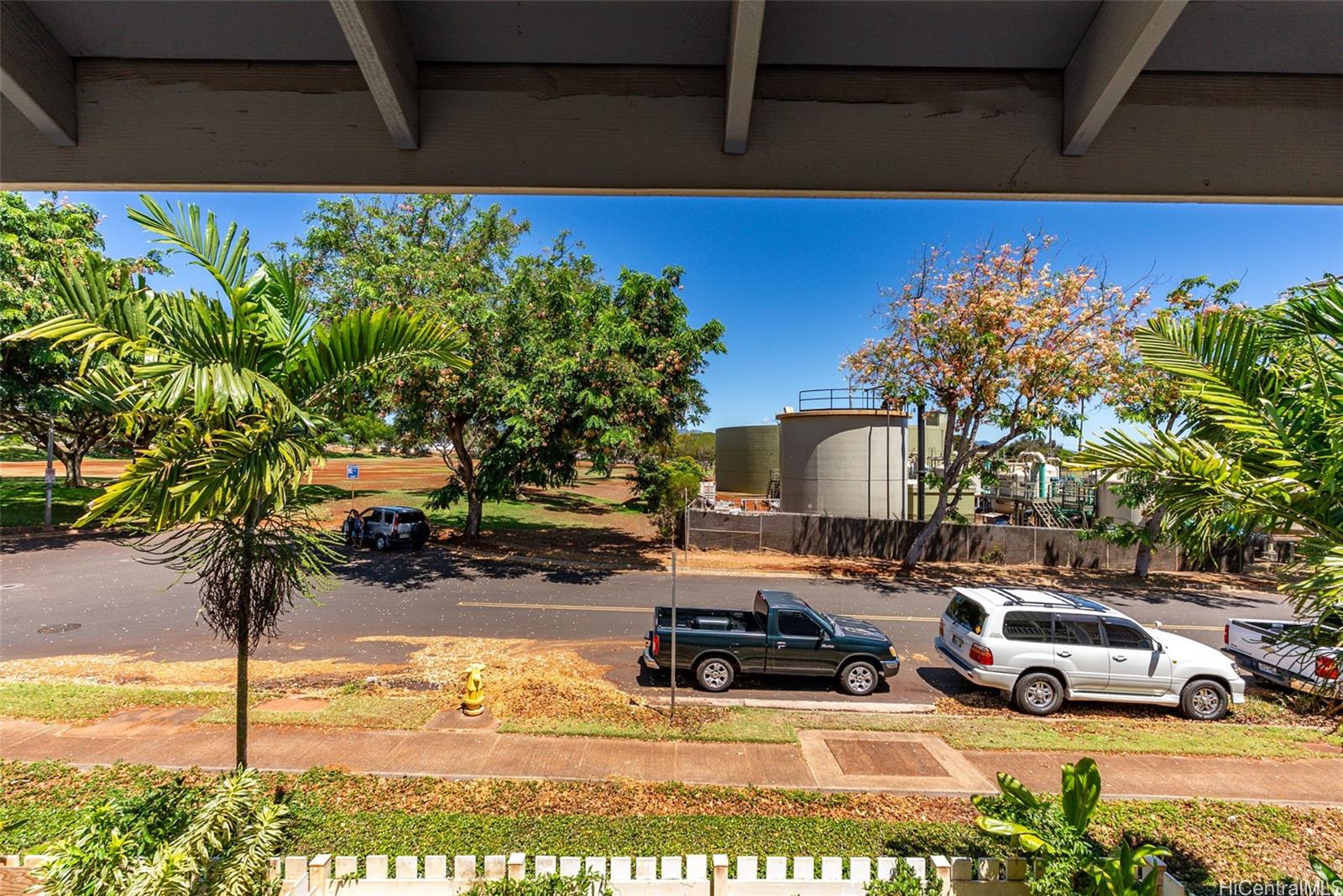 94-201 Lumiaina Place, Unit E202 Waipahu, HI 96797 - Photo 23 of 25 a view of a street with cars on road