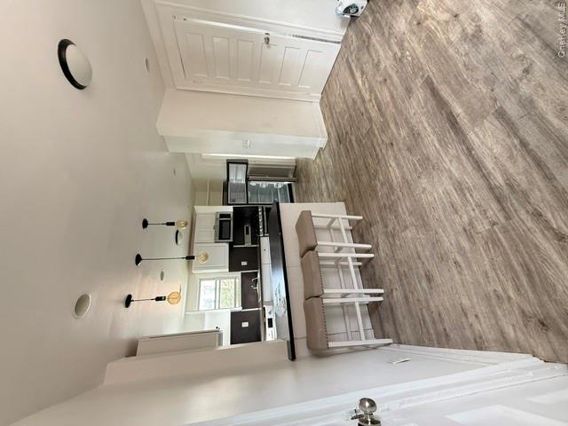 72 Chauncey Avenue New Rochelle, NY 10801 - Photo 14 of 14 a living room with stainless steel appliances furniture a kitchen view and a kitchen island