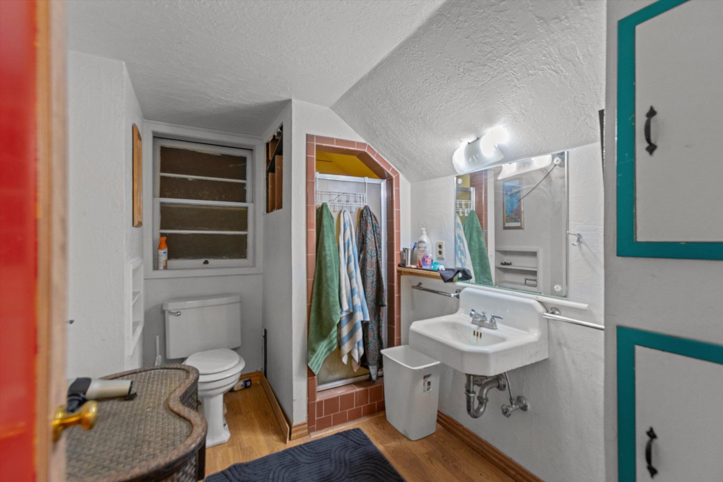 4115 North Lake Boulevard Carnelian Bay, CA 96140 - Photo 18 of 28 a bathroom with a sink a toilet and shower