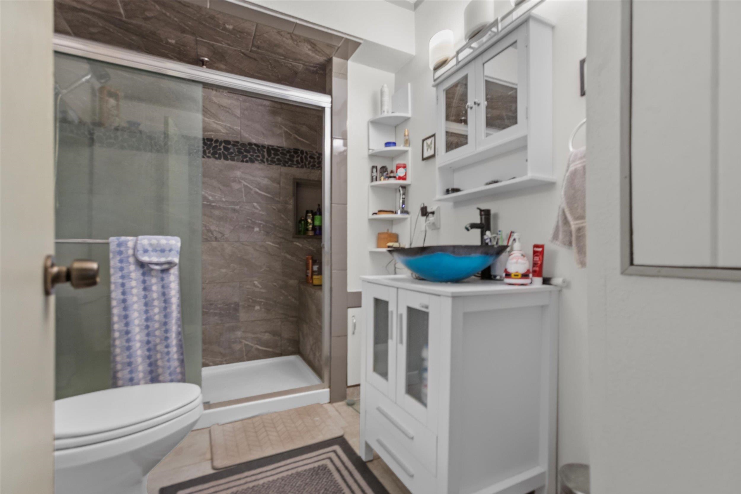 4115 North Lake Boulevard Carnelian Bay, CA 96140 - Photo 22 of 28 a bathroom with a bathtub and a toilet