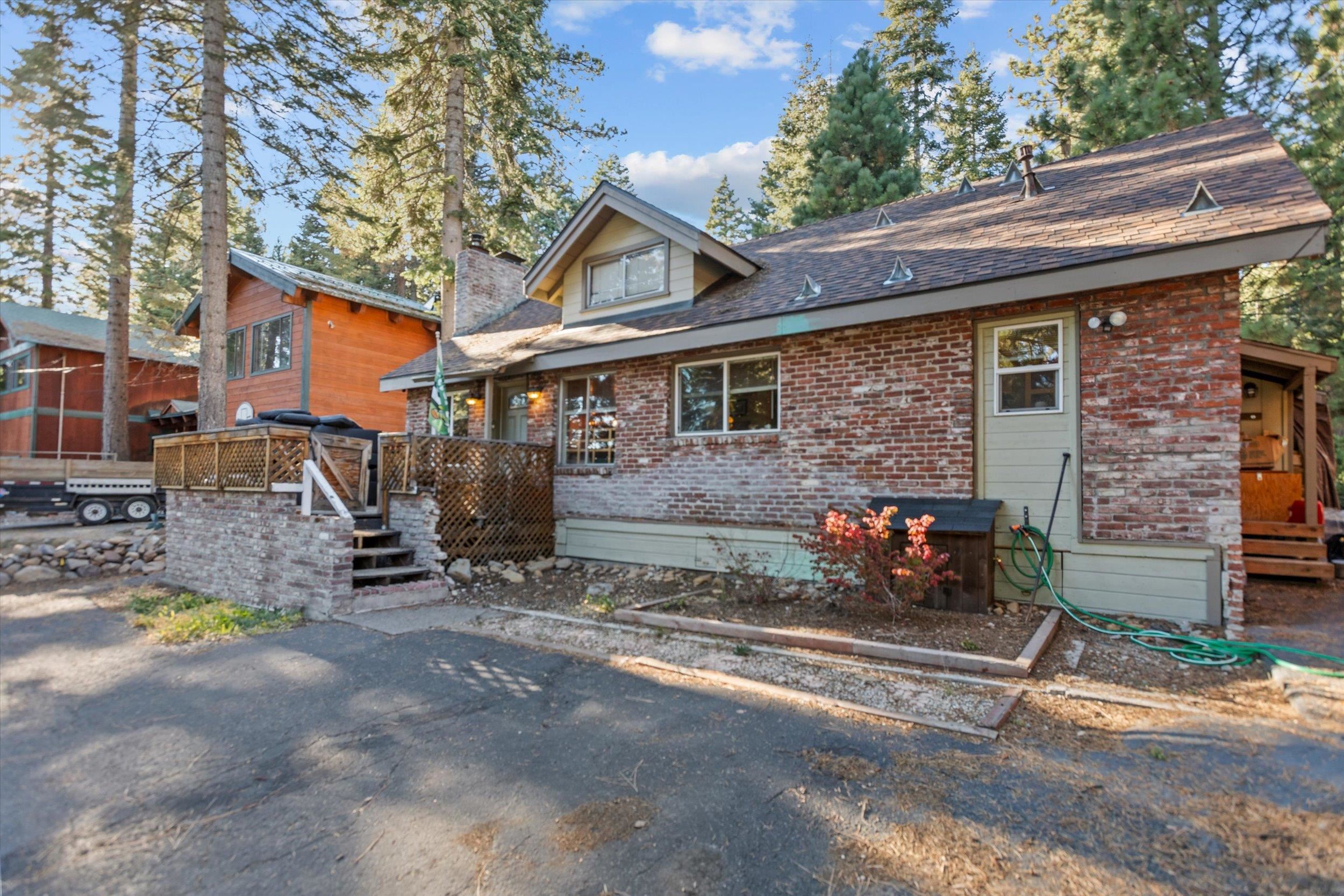 4115 North Lake Boulevard Carnelian Bay, CA 96140 - Photo 3 of 28 a view of a house with a patio