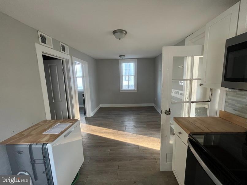 81 Main Street Yorkana, PA 17406 - Photo 6 of 16 a view of a kitchen cabinets and a wooden floor